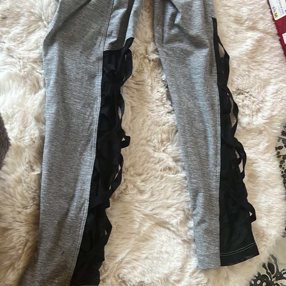Like new Victoria’s Secret pink leggings size large. Gray with black Kris Kross